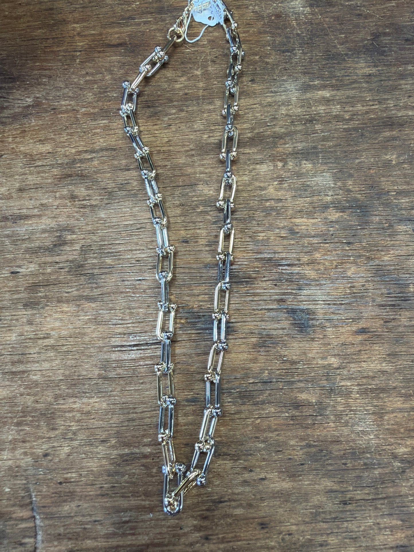 necklace alternating gold and silver chain links