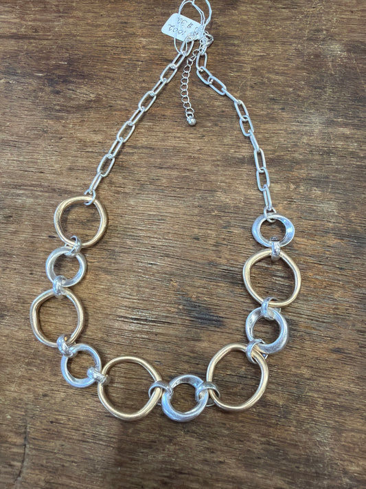 necklace alternating gold and silver circles irregular shapes